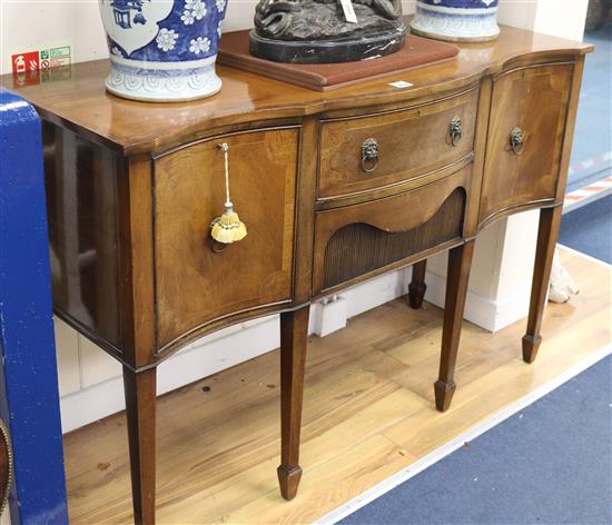 A George III design banded mahogany serpentine fronted sideboard, W.137cm